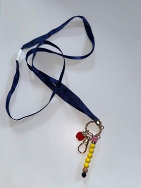 Spritz Navy Lanyard with Yellow Bead Tassel and Red Apple Charm